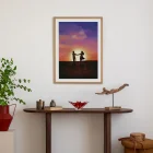 Illustration of a couple dancing at sunset in a field of flowers.