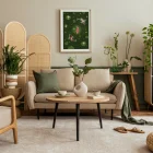 Illustration of a woman laying on a lilypad in a pond with koi fish.